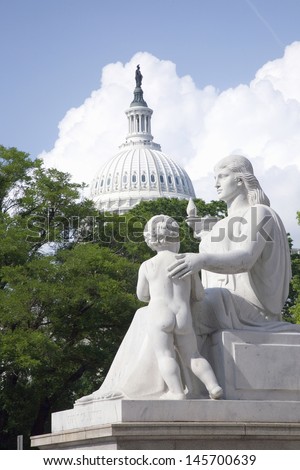 Greek-Roman statue with U.S. Capitol dome in the background, Washington, D.C.
