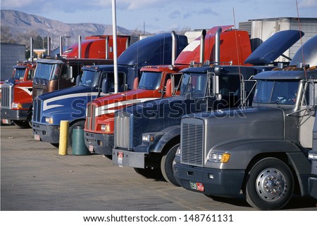 MOJAVE, CALIFORNIA - CIRCA 1990's: Big rig trucks at truck stop, Mojave, California