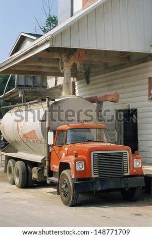 MIDWEST - CIRCA 1980\'s: Truck being loaded with grain