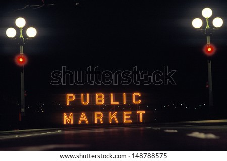 SEATTLE, WA - CIRCA 1990's: A neon sign that reads `public market` in Seattle, WA.