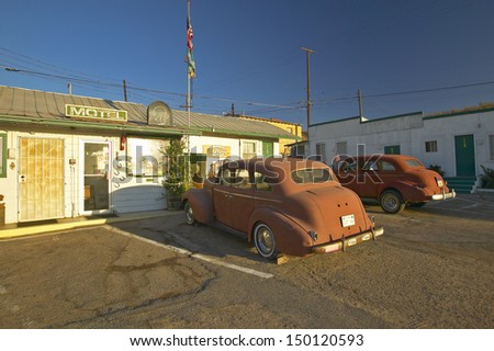 BARSTOW, CALIFORNIA - JULY 29: Route 66 neon sign and historic vintage roadside motel welcomes old cars and guests on July 29, 2004 in Barstow California