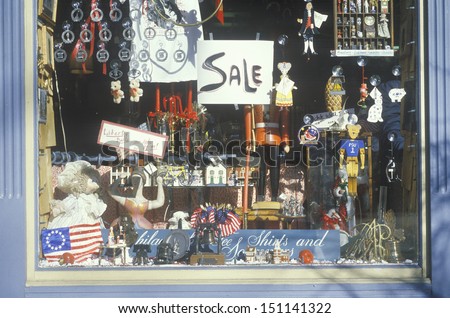 PHILADELPHIA - CIRCA 1980's: Novelty items in storefront a window, Philadelphia, PA