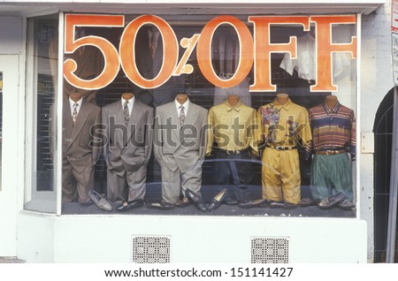 WASHINGTON DC - CIRCA 1980's: Discounted men's clothes in storefront window, Georgetown, Washington D.C.