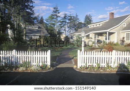 SPRUCE HEAD HARBOR, MAINE - CIRCA 1980\'s: House with white picket fence ,Spruce Head Harbor, ME