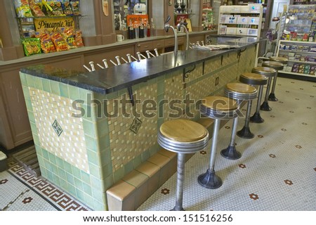 NEW ORLEANS - CIRCA 1980\'s: Interior of old drug store with bar stools and soda fountain in French Quarter of New Orleans LA