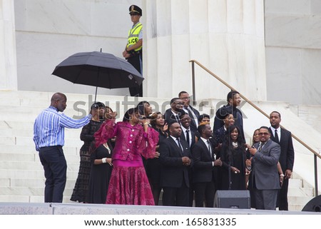Bebe, Marvin and Carvin Winans and choir sing at the Let Freedom Ring ceremony at the Lincoln Memorial August 28, 2013 in Washington, DC, the 50th anniversary of Dr. Martin Luther King speech