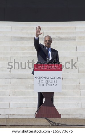 U.S. Attorney Eric Holder Jr. waves at the 50th Anniversary of the march on Washington and Martin Luther King\'s Speech, August 24, 2013, Lincoln Memorial, Washington, D.C.