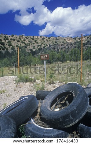 Old tires in junk yard in Arizona
