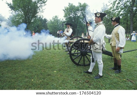 Firing cannons during Historical Revolutionary war reenactment, Daniel Boone Homestead, Continental Army, artillery division