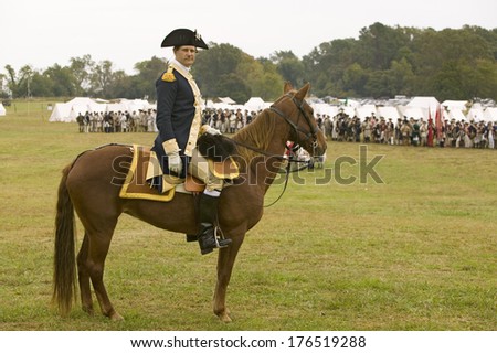 General George Washington reviews Patriot and Colonial Troops at camp before marching to Surrender Field at the 225th Anniversary of the Victory at Yorktown, Virginia, Revolutionary War.