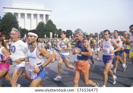 Runners going by Lincoln Memorial, Washington Memorial, Washington, D.C.