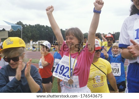 Young Handicapped athlete celebrating during Special Olympics, UCLA, CA
