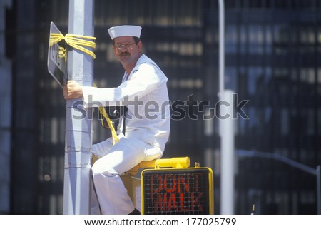 Sailor Sitting on Traffic Sign, New York City, New York