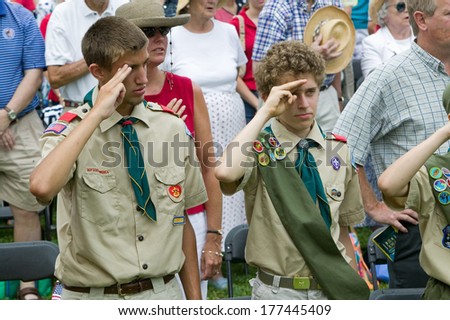 Boy scouts salute for American citizens at Independence Day Naturalization Ceremony on July 4, 2005 at Thomas Jefferson\'s home, Monticello, Charlottesville, Virginia.