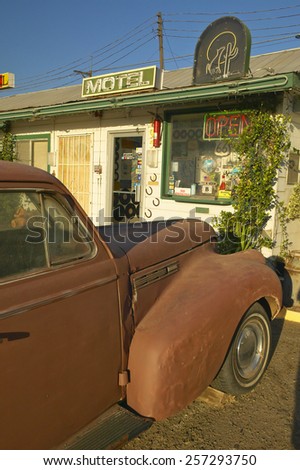 Historic vintage roadside motel on old Route 66 welcomes old cars and guests in Barstow California