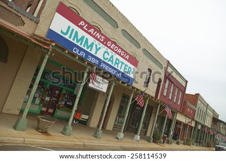 Storefront with banner exclaiming Plains Georgia to be the home of Jimmy Carter, our 39th President in Plains, Georgia