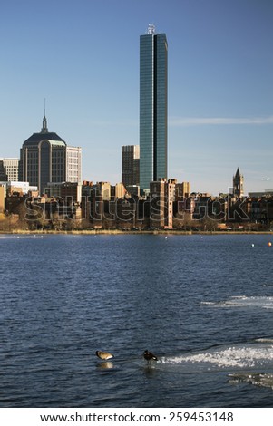Boston Skyline and Prudential building in winter on half-frozen Charles River, Massachusetts, USA, 03.18.2014