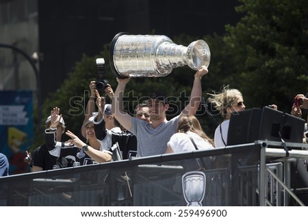 Goalie Jonathan Quick holds Stanley Cup, LA Kings 2014 Victory Parade, Los Angeles, California, 06.16.2014