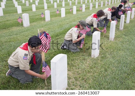 Boyscouts placing one of 85, 000 US Flags at 2014 Memorial Day Event, Los Angeles National Cemetery, California, USA, 05.24.2014