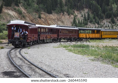 Three Brakemen on Durango and Silverton Narrow Gauge Railroad Steam Engine Train, Silverton, Colorado, USA, 07.07.2014