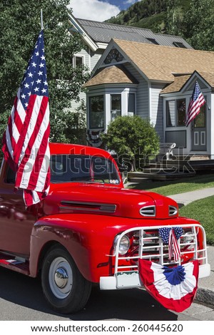 Antique Red Truck and US Flag, July 4, Independence Day Parade, Telluride, Colorado, USA, 04.07.2014