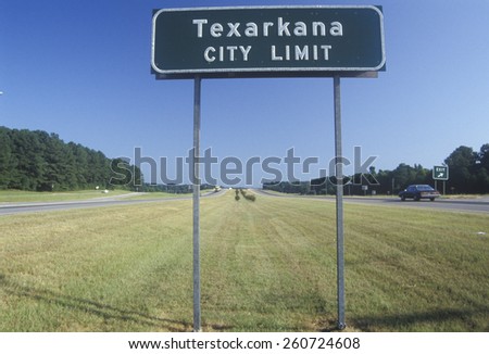 A sign reads Texarkana, Texas