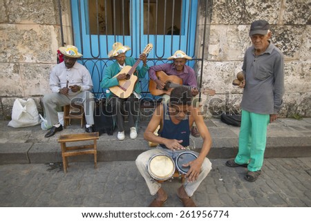 Cuba musicians playing music on streets at Catedral de la Habana, Plaza del Catedral, Old Havana, Cuba