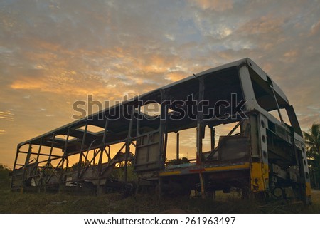 Sunrise on old deserted bus in El Rincon, Cuba