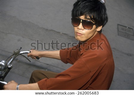 Bicycle riders in Shanghai, People's Republic of China