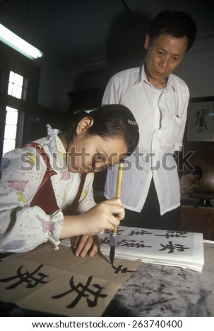 Calligraphy class at the Children\'s Palace of Changning District in Shanghai in Zhejiang Province, People\'s Republic of China