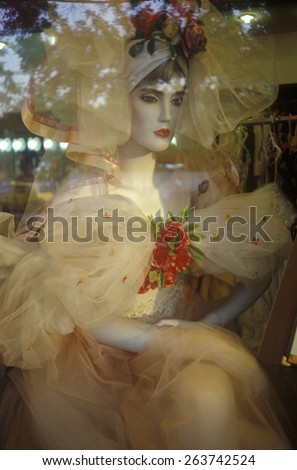 Wedding gown in storefront of bridal store in Beijing in Hebei Province, People\'s Republic of China