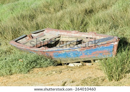 Old blue row boat on land at Palos de la Frontera - La RÃ?Â¡bida, the Huelva Provence of Andalucia and Southern Spain, where Columbus departed from the Old World to the New World in August 3 of 1492