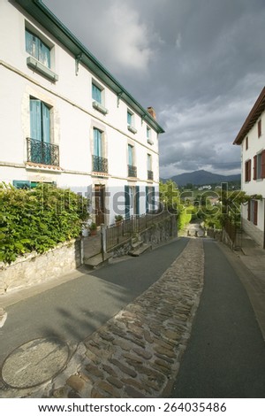 Path between homes in Sare, France in Basque Country on Spanish-French border, a hilltop 17th century village in the Labourd province.