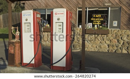 Antique red gas pumps in front of old gas station in Malibu, Southern California north of Los Angeles