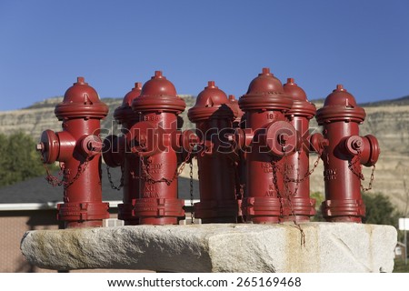 Red fire hydrants in Palisade Colorado, east of Grand Junction