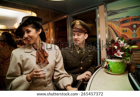 1940\'s Army reenactor flirts with woman at bar on Pearl Harbor Day Troop train reenactment from Los Angeles Union Station to San Diego