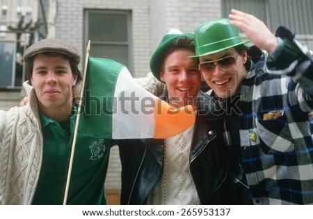 Three young men enjoying the 1987 St. Patrick\'s Day Parade, NY City