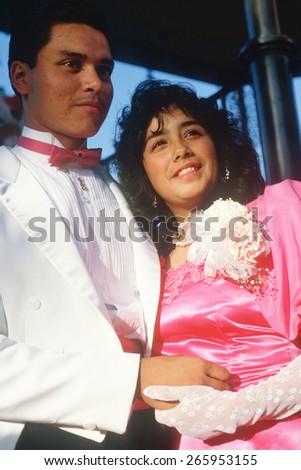 A young Mexican couple in formal attire, Olvera Street, Los Angeles, CA