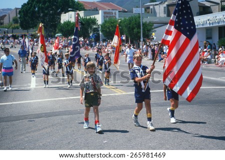 Boy scout troop color guard leading the 4th of July parade, Pacific Palisades, CA