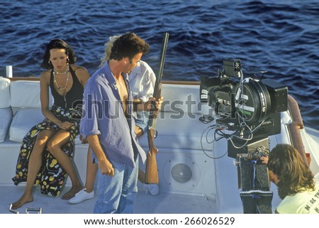 Scene from set of \'Temptation\' on yacht with guns, feature film, Miami, FL