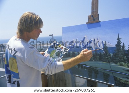 An art student painting a scenic, Los Angeles, CA