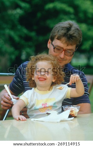 A father and daughter eating ice cream, Westfield, NY