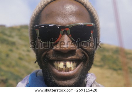 A gap-toothed African-American man smiling, San Francisco, CA