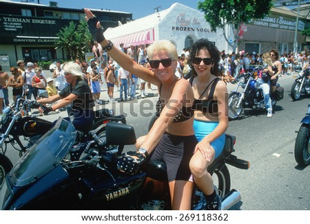Lesbian couple on a motorcycle at the 19th annual Gay and Lesbian Pride Parade, Hollywood, CA