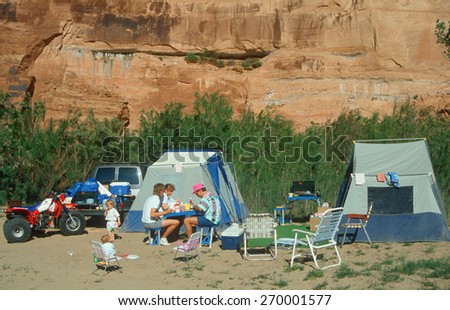 Families eating at their campsite, Colorado River in Moab, Utah