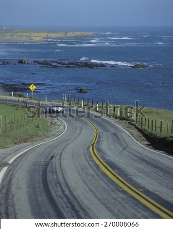 Spring Road on Route 1 Pacific Coast Highway in California with view of the Pacific Ocean