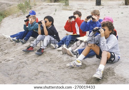Students birdwatching at Upper Bay Ecological Reserve, CA