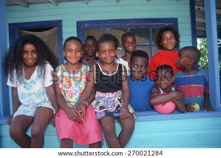 African-American brothers and sisters on their front porch African-American brothers and sisters on their front porch