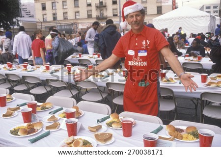 Volunteer at Christmas dinner for the homeless, Los Angeles, California