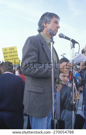 Political activist, Tom Hayden, speaking at rally, Washington D.C.